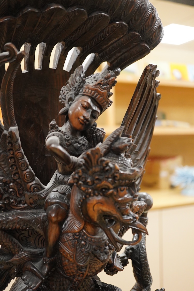 A large Indonesian hardwood Garuda group and a Chinese hardwood figure of a Luohan, largest 61cm high